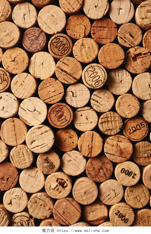 一堆树桩的横切面葡萄酒瓶塞背景